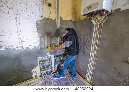 pipefitter installing system of heating