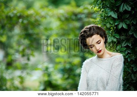 Young Vintage Style Woman Posing In A Vineyard