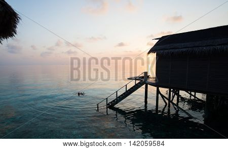 Snorkel in the morning with sunrise Great view from Maldives