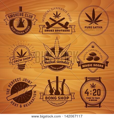 Set of vector marijuana smoking badges. Medical cannabis labels on a wooden background