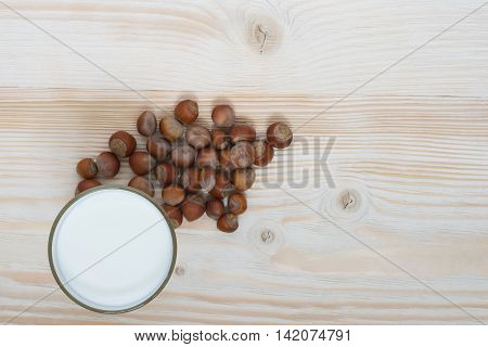 hazelnut milk hazelnut, on the beautiful wooden board
