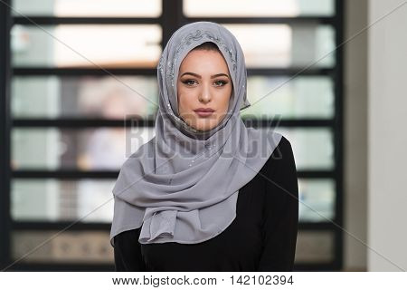 Young Woman Praying In The Mosque