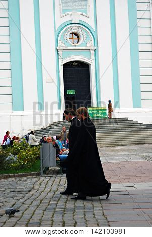 SERGIEV POSAD, RUSSIA - SEPTEMBER 06, 2012: Priests in Trinity Sergius Lavra Sergiev Posad Russia. UNESCO World Heritage Site.