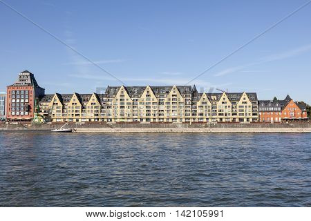 Old warehouses at the Rhine river in Cologne now converted into luxury apartment buildings. North Rhine-Westphalia Germany