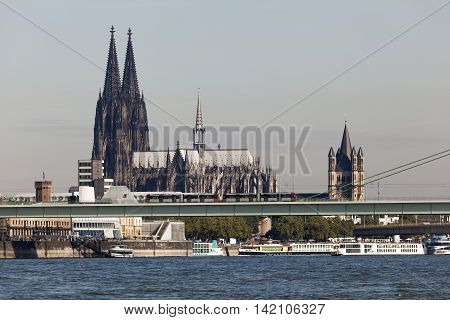 The Cologne Cathedral and St. Martins Church in the city of Cologne North Rhine-Westphalia Germany