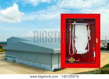 Fire safety equipment cabinet line industrial background.