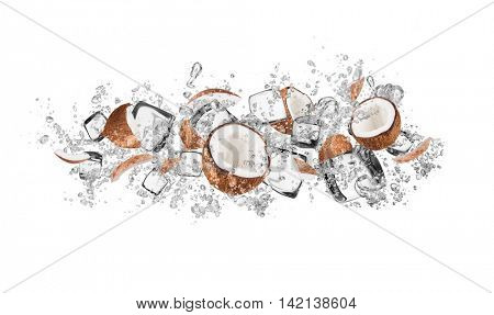 Pieces of coconuts in water splash and ice cubes, isolated on white background