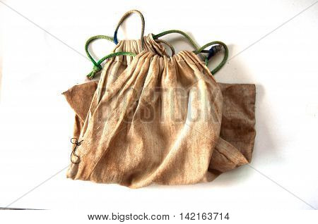 Old Cotton drawstring bag on white background