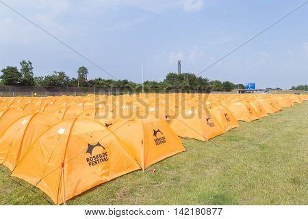 Roskilde, Denmark - June 25, 2016: Rows of orange tents at the Roskilde Festival 2016