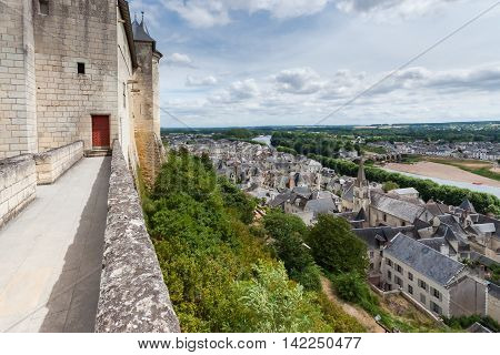 Chinon walled castle. Chinon is a commune located in the Indre-et-Loire department in the Region Centre. The Loire Valley with its castles is UNESCO World Heritage Site France