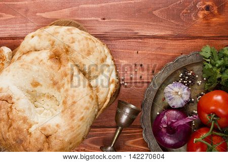 Traditional uzbek flatbread and a set of spices