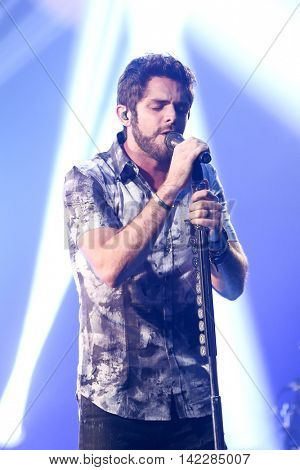 NEW YORK-SEPT 28: Country music artist Thomas Rhett performs at the iHeartRadio Album Release Party with Thomas Rhett on September 28, 2015 at the iHeartRadio Theater in New York City.