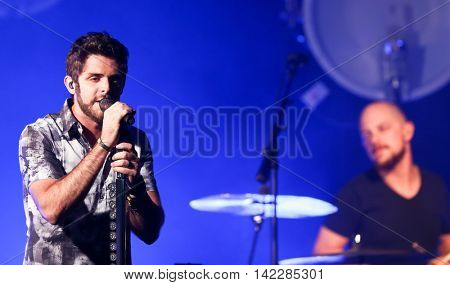 NEW YORK-SEPT 28: Country music artist Thomas Rhett performs at the iHeartRadio Album Release Party with Thomas Rhett on September 28, 2015 at the iHeartRadio Theater in New York City.