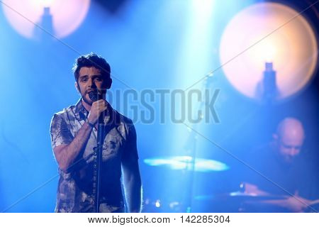 NEW YORK-SEPT 28: Country music artist Thomas Rhett performs at the iHeartRadio Album Release Party with Thomas Rhett on September 28, 2015 at the iHeartRadio Theater in New York City.