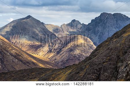 The Scottish Highlands. Detailed photo of the Cuillin mountains on a cloudy day - Isle of Skye, Scotland, UK