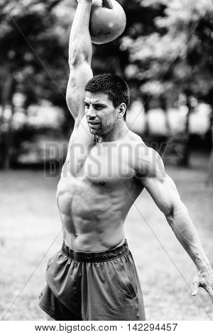 Crossfit Athlete Lifting Kettle Bell