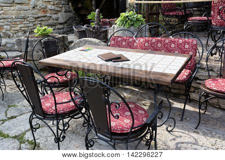 Outdoor cafe or restaurant table and chairs