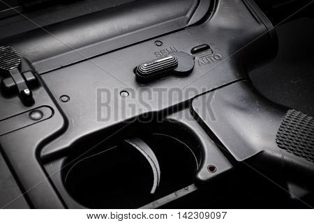 close-up auto mode of M4A1 assult rifle on black background