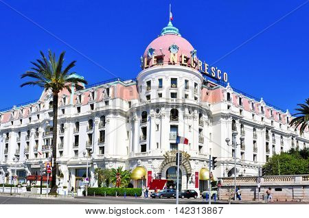 NICE, FRANCE - MAY 16: The famous Le Negresco Hotel on May 16, 2015 in Nice, France. This historic luxury hotel, located in the Promenade des Anglais, is a landmark in the city