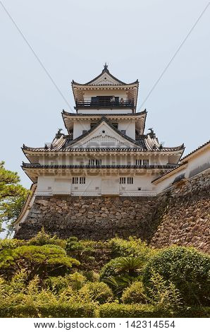 KOCHI JAPAN - JULY 19 2016: Main keep (tenshukaku) of Kochi castle (circa 18th c.) Shikoku Island Japan. Kochi is one of only 12 survived castles in Japan