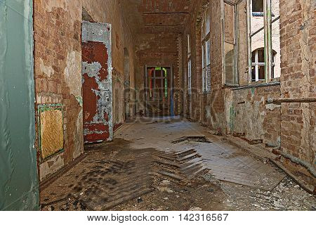 Long corridor in an old abandoned building