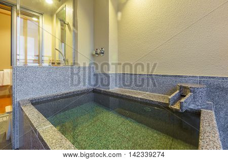 Private onsen bathtub in Japanese style bath