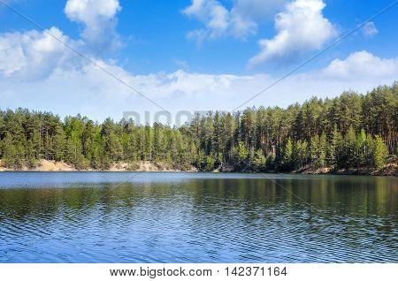 Beautiful autumn Alpine  lake and forest landscape
