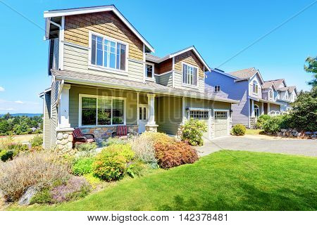 Curb Appeal Of Luxury Family House With Nice Landscape.
