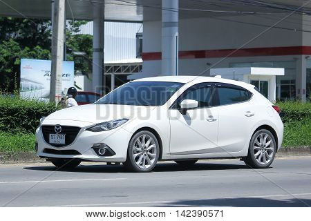 CHIANGMAI THAILAND -JULY 27 2016: Private Eco car Mazda 3. On road no.1001 8 km from Chiangmai Business Area.