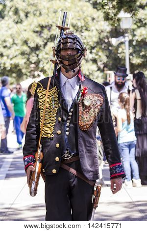 CAGLIARI, ITALY - May 29, 2016: Sunday at La Grande Jatte VIII Ed. At the Public Gardens - Sardinia - portrait of a man in a steampunk costumes