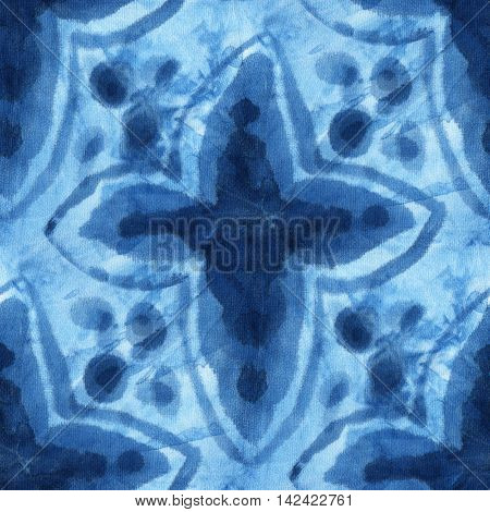 Seamless tie-dye pattern of indigo color on white silk. Hand painting fabrics - nodular batik. Shibori dyeing.