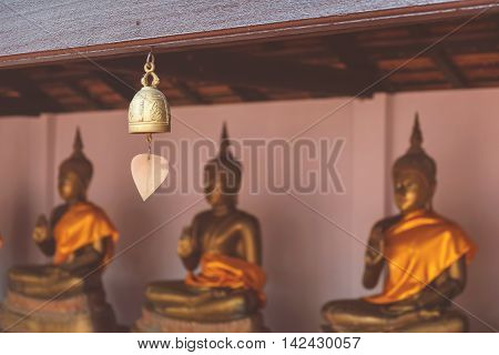 Tradition asian bells hanging in the temple. Filterd color.