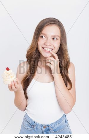 Girl Deciding To Eat Dessert