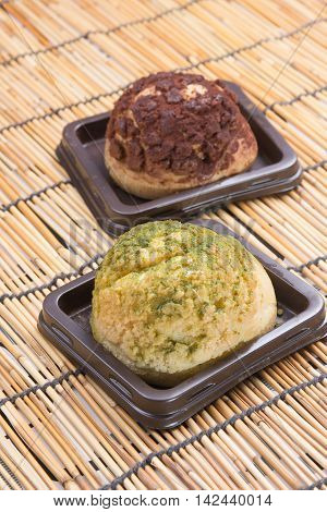 Chocolate and green tea choux cream on the tray