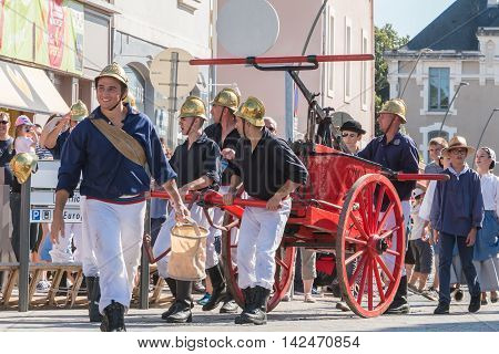 Antique Firefighters To Intervene With A Water Pump