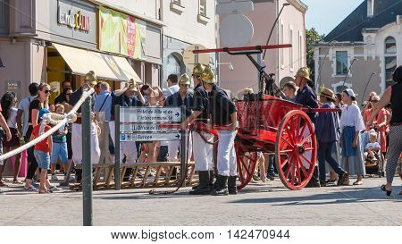 Antique Firefighters To Intervene With A Water Pump
