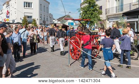 Antique Firefighters To Intervene With A Water Pump
