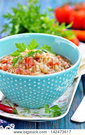 Baba ganoush salad with eggplant, tomato, onion, olive oil and sea salt.