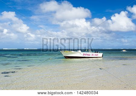BEL OMBRE, MAURITIUS ISLAND - JUNE 16, 2016: Diving boats in Bel Ombre rocky beach, Mauritius island, June 16, 2016
