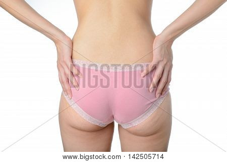 asian woman show her fat and cellulite on buttocks on white background