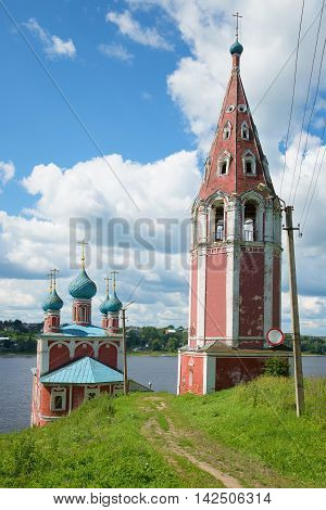 At the old church of Our Lady Mother of Kazan on the Volga river july afternoon. Tutayev Russia