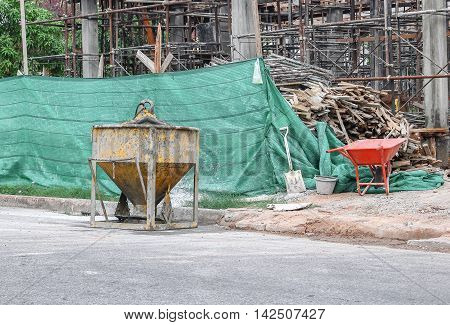 Concrete mixer container at construction site .