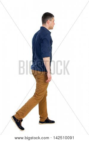 Back view of going  handsome man. walking young guy . Rear view people collection.  backside view of person.  Isolated over white background. a man in a blue shirt with the sleeves rolled up, sad is