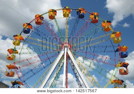 Ferris wheel in summer park of culture and recreation in the city of Chita Russia
