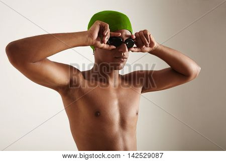 Closeup Of A Young Black Swimmer In Cap And Goggles