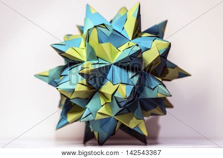 origami paper composition white background studio closeup