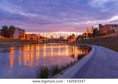 Neris river and church Vilniaus Sv. Arkangelo Rapolo Baznycia, Vilnius at sunset, Lithuania, Baltic states.