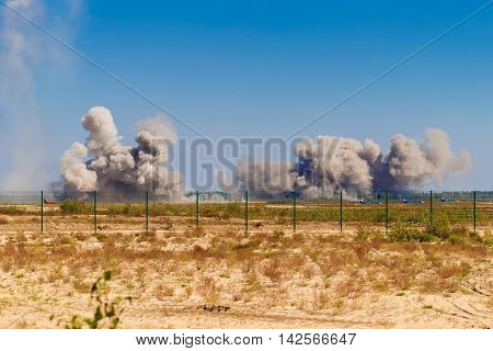 An explosion after a bombing at a military airfield.