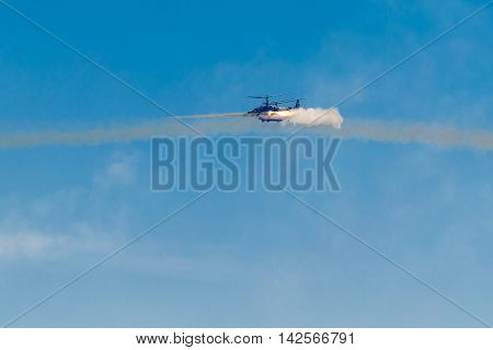 August 6 2016. Ryazan Russia. The helicopter of the Military Air forces of Russia launches missiles at an Airshow. Documentary Editorial Image.