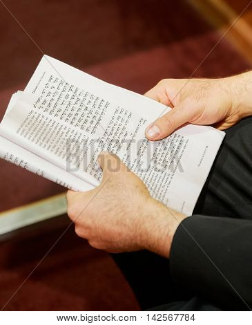 Hand Of Boy Reading The Jewish Torah At Bar Mitzvah 01 August 2015
